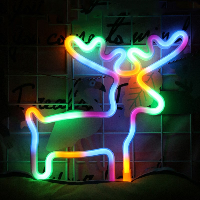 Neon Light Shape Neon Light Shape displayed in a festive scene with various light shapes on decorative trees.