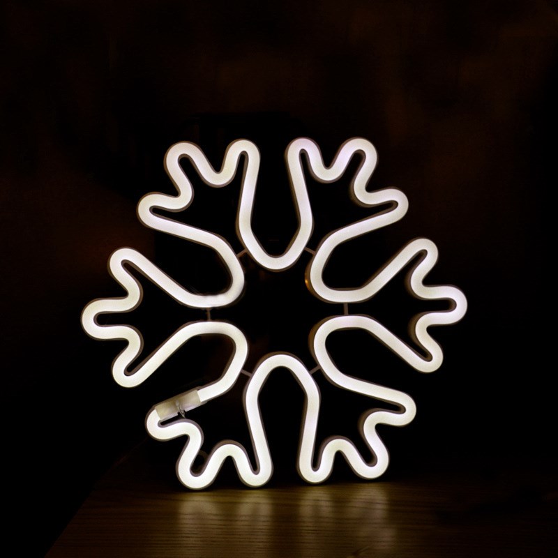 Neon Light Shape Neon Light Shape displayed in a festive scene with various light shapes on decorative trees.