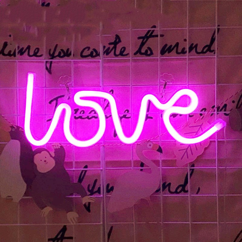 Neon Light Shape Neon Light Shape displayed in a festive scene with various light shapes on decorative trees.