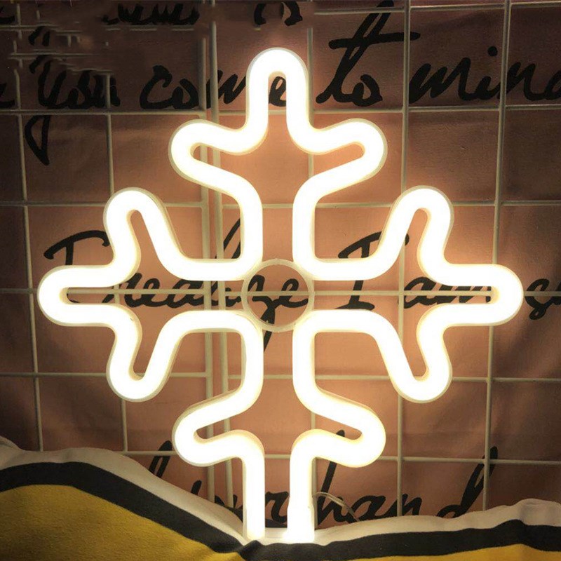 Neon Light Shape Neon Light Shape displayed in a festive scene with various light shapes on decorative trees.