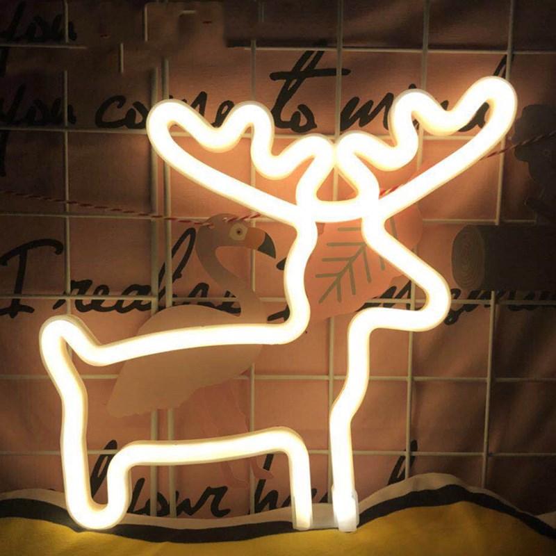 Neon Light Shape Neon Light Shape displayed in a festive scene with various light shapes on decorative trees.