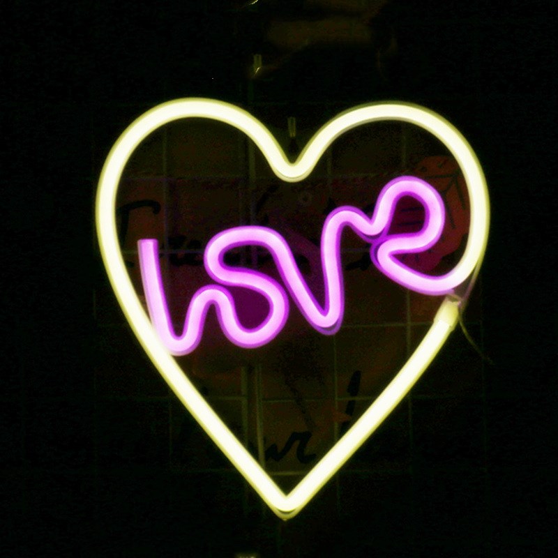 Neon Light Shape Neon Light Shape displayed in a festive scene with various light shapes on decorative trees.